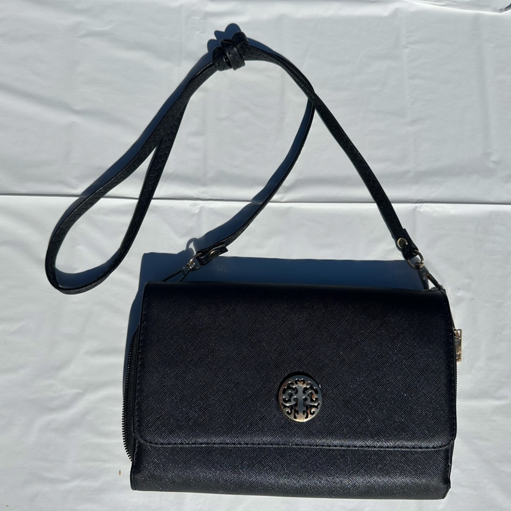 Preowned Sasha crossbody handbag black in color